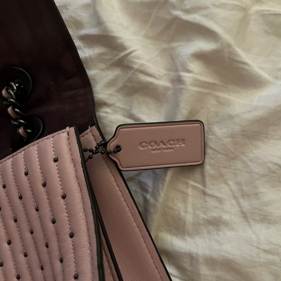 Coach purse with metal studs and braided pink and metal strap. - Picture 2 of 4